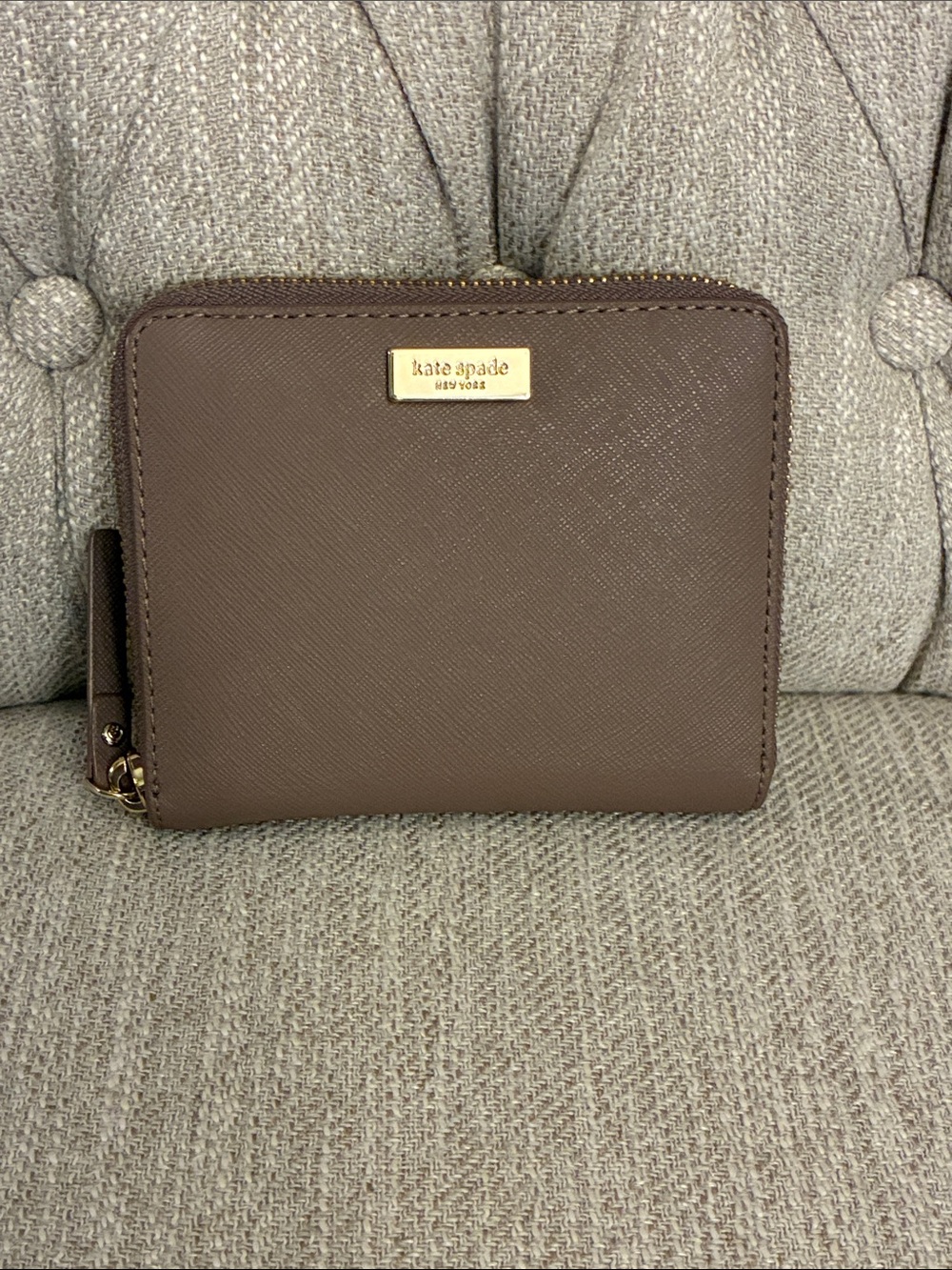 kate spade brown saffiano zip-around wallet with gold plaque